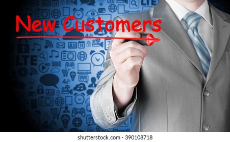 businessman writing new customers - Shutterstock ID 390108718