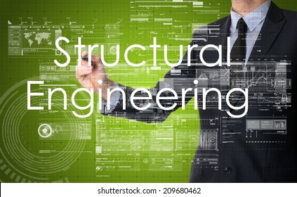 Businessman Writing Technological Terminology On Virtual Screen With Modern Business Or Technology Background - Structural Engineering