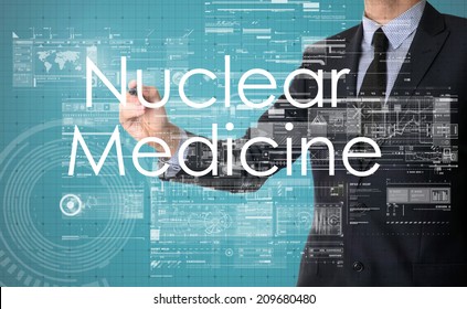 Businessman Writing Technological Terminology On Virtual Screen With Modern Business Or Technology Background Nuclear Medicine