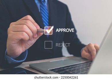 Businessman writing or tick correct mark to approve document icon and project concept.Quality management with Quality Assurance or QA and Quality Control or QC and improvement.