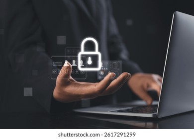 businessman's hand interacting with futuristic virtual interface showing personal data protection and corporate security icons to depict privacy and data breach prevention in modern workplaces