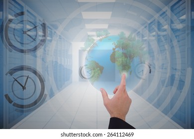 Businessmans hand presenting against server hallway