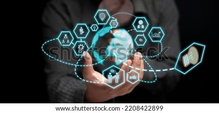 businessman's hand Show the concept of business technology in the communication world and work together as an organization through world-class technology.