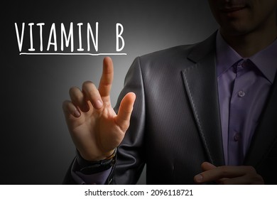 Businessman's Hand Shows Vitamin B