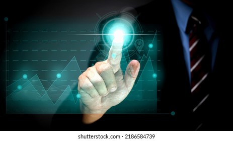 Businessman's Hand Touches Virtual Man's Head Button. Idea. Spark Business Idea. Business Goals And Achievements With New Concept Copy Space.