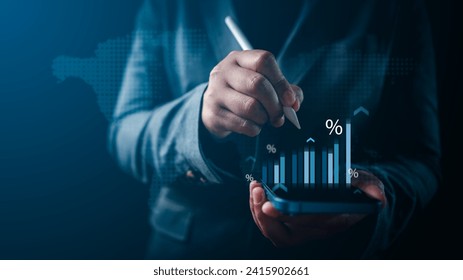 as businessman's hands touch a virtual screen displayed from a smartphone, analyzing data and trends in the stock market, interest rates, investment, international finance, currency exchange
