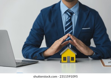 Businessmen, accountants, lawyers work in the office investment, insurance, detailed information record. Financial contract documents, leasing, protection, care, real estate concept. - Shutterstock ID 2311591095