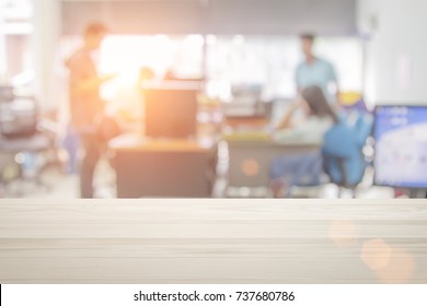 Businessmen blur in the workplace or work space of table in office room with computer or shallow depth of focus of abstract background.