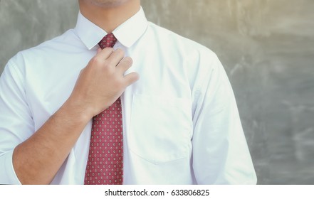 Businessmen Are Decorating A Red Necktie On The Day Of His First Day Job