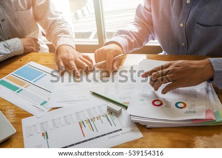 businessmen discussing together in meeting room