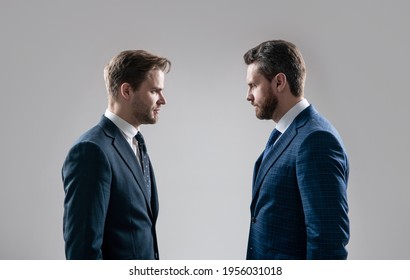 businessmen face to face. disrespect and contradiction. business partners blame each other. arguing businesspeople. dissatisfied men discuss failure. two colleagues have disagreement and conflict.