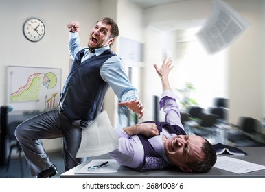 Businessmen Fighting In The Office