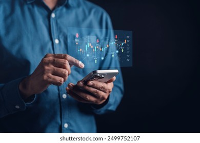 Businessmen investor trading stock market investment using smartphone to analyze trading data. investor analysis with stock exchange graph on screen. Financial stock market.