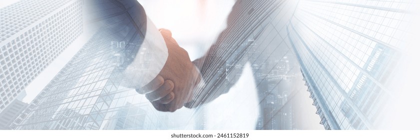 Businessmen making handshake with partner, greeting, dealing, merger and acquisition, business cooperation concept, joint venture, copy space for business, finance and investment background - Powered by Shutterstock