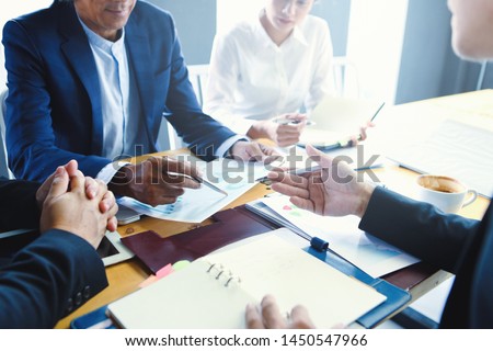 Businessmen are meeting negotiations on trade and investment.
Concepts. Business meetings, planning, negotiating