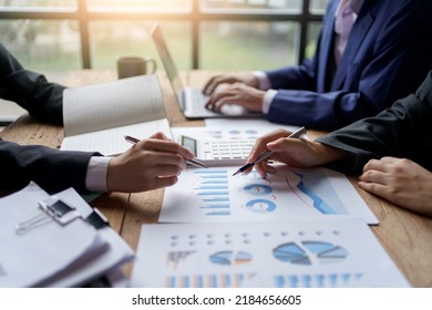 Businessmen meeting to plan, analyze, graph and chart business growth. to plan for new business expansion in the future. - Shutterstock ID 2184656605