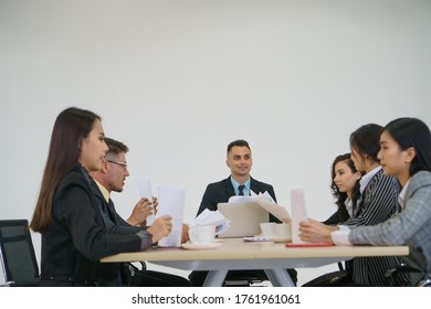 Businessmen Are Meeting Together And Chatting In The Meeting Room In Friendship. A Group Of Businessmen Enters Into An Agreement To Find A Resolution To The Conflict That Has.