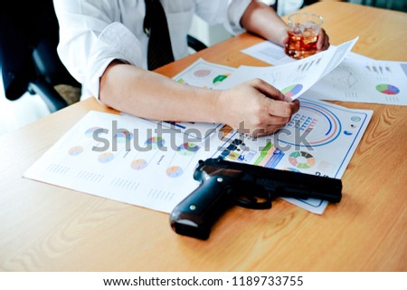 Businessmen with money in hand, US dollars, investment, success and profitable business ideas. Businessman with a firearm.