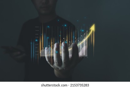 Businessmen open the graph plotting strategies to invest in the stock market, the thriving financial world online, investor success ideas in trading.