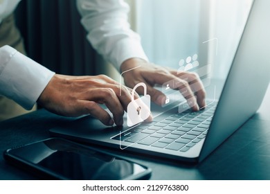 Businessmen protecting personal data on laptop and virtual interfaces, user typing login and password, cyber security concept.