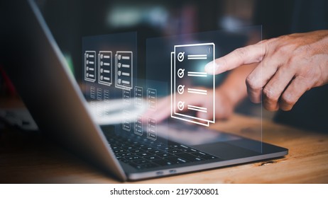 Businessmen review procedures through documents containing checkbox lists, rules of conduct concepts, rules and policies, company regulatory documents, terms and conditions. - Shutterstock ID 2197300801
