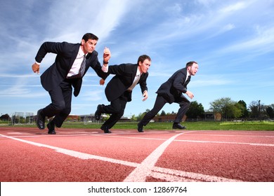 Businessmen running on track - Powered by Shutterstock