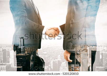 Similar – Image, Stock Photo Two young men shake hands. Close up of the hands in front of a green background.