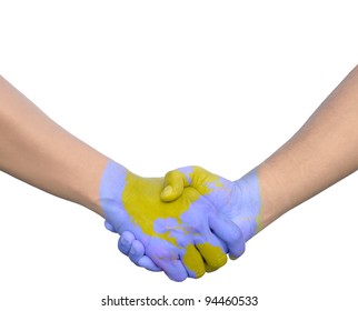 Businessmen shaking world painted hands