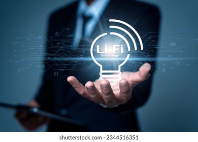 Businessmen showing Li-Fi technology as a new modern wireless internet network Use a high-speed connection For fast work, save time, increase work efficiency. for driving business in the online world