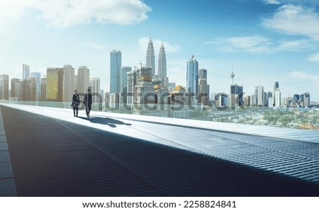 Businessmen talking on modern city street