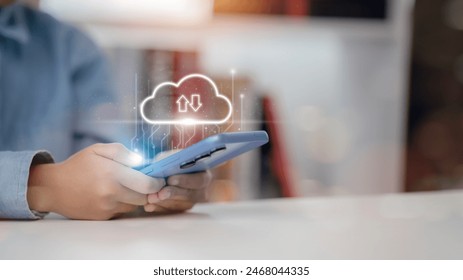 Businessmen use cloud computing on smartphones Database storage cloud technology file data transfer sharing, and big data information. application or computer download upload backup cloud drive.