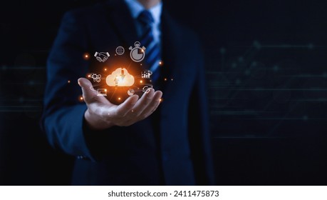 Businessmen use computers to visualize large online data in the cloud.
It is a cloud server backup platform technology to ensure the safety of business data communications and data download systems.