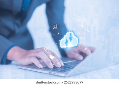Businessmen use computers to visualize large online data in the cloud.
It is a cloud server backup platform technology to ensure the safety of business data communications and data download systems.