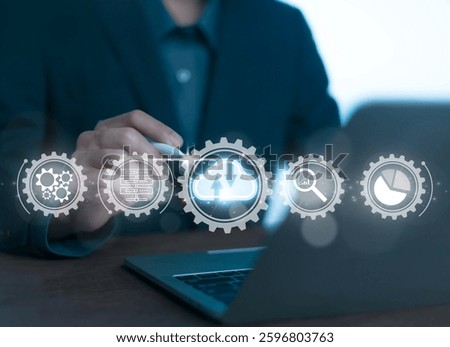 Businessmen use computers to visualize large online data in the cloud.
It is a cloud server backup platform technology to ensure the safety of business data communications and data download systems.