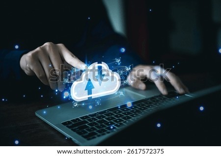 Businessmen use computers to visualize large online data in the cloud.
It is a cloud server backup platform technology to ensure the safety of business data communications and data download systems.
