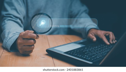 Businessmen use laptop and holding magnifying glass for searching information on internet network.
Search engine technology concept. Search progressing, Searching everything on internet network. - Powered by Shutterstock