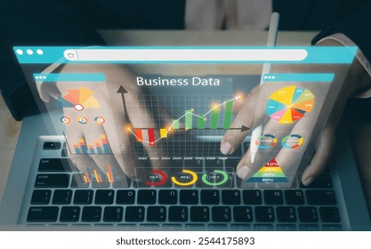 Businessmen use laptops and dashboards for automating data management analytics and business reports. Database. Sales. Marketing. AI chat bot. Data analytics is automated with AI technology. - Powered by Shutterstock