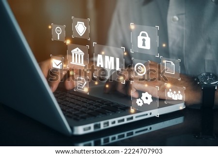 Businessmen using a computer to AML Anti Money Laundering Financial Bank Business Technology Concept
