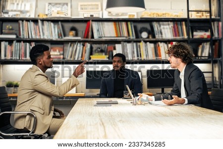 Businesspeople dissatisfied, disagree and complain, disputing to company service, marketing idea while sitting in modern meeting room at office