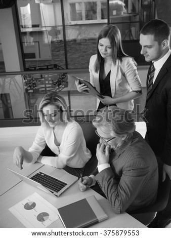 Businesspeople Having Meeting In Modern Office