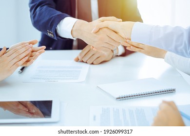 Businesspeople Or Lawyers Shaking Hands Finishing Up Meeting Or Negotiation In Sunny Office. Business Handshake And Partnership