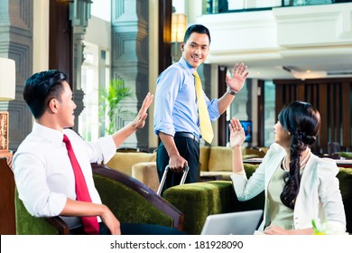 Businesspeople Saying Goodbye In A Hotel
