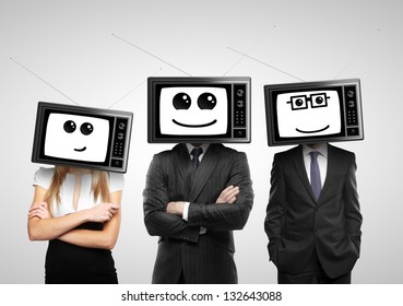 businesspeople with tv head on a gray background
