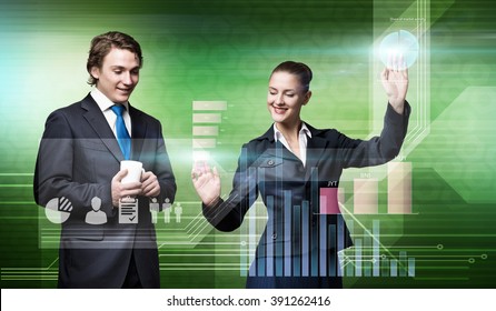 Businesspeople using modern technologies