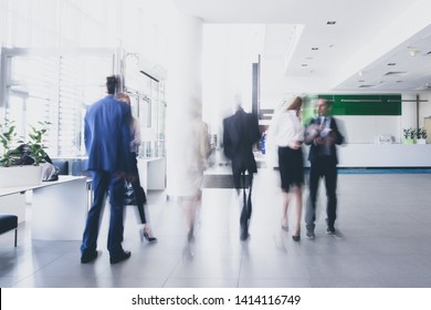 Businesspeople Walking In The Corridor Of An Business Center, Pronounced Motion Blur