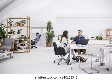 Businesspeople Working At Big White Open Space Business Office.