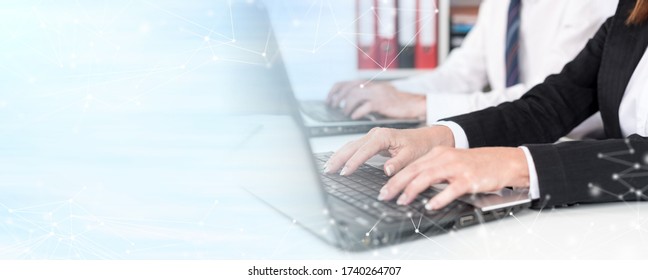 Businesspeople Working On A Laptop During Training; Panoramic Banner