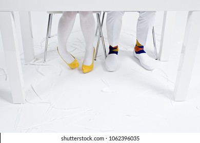 Businesspeoples Feet Under Table