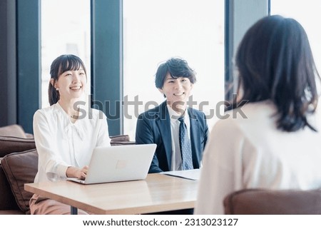 Businessperson having a business meeting with a client