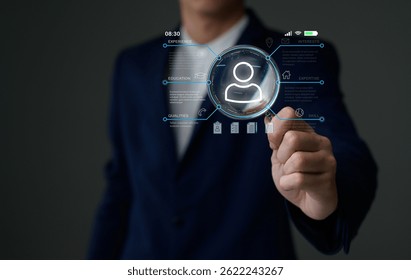 A businessperson interacts with a futuristic digital interface displaying user profile and data analytics.